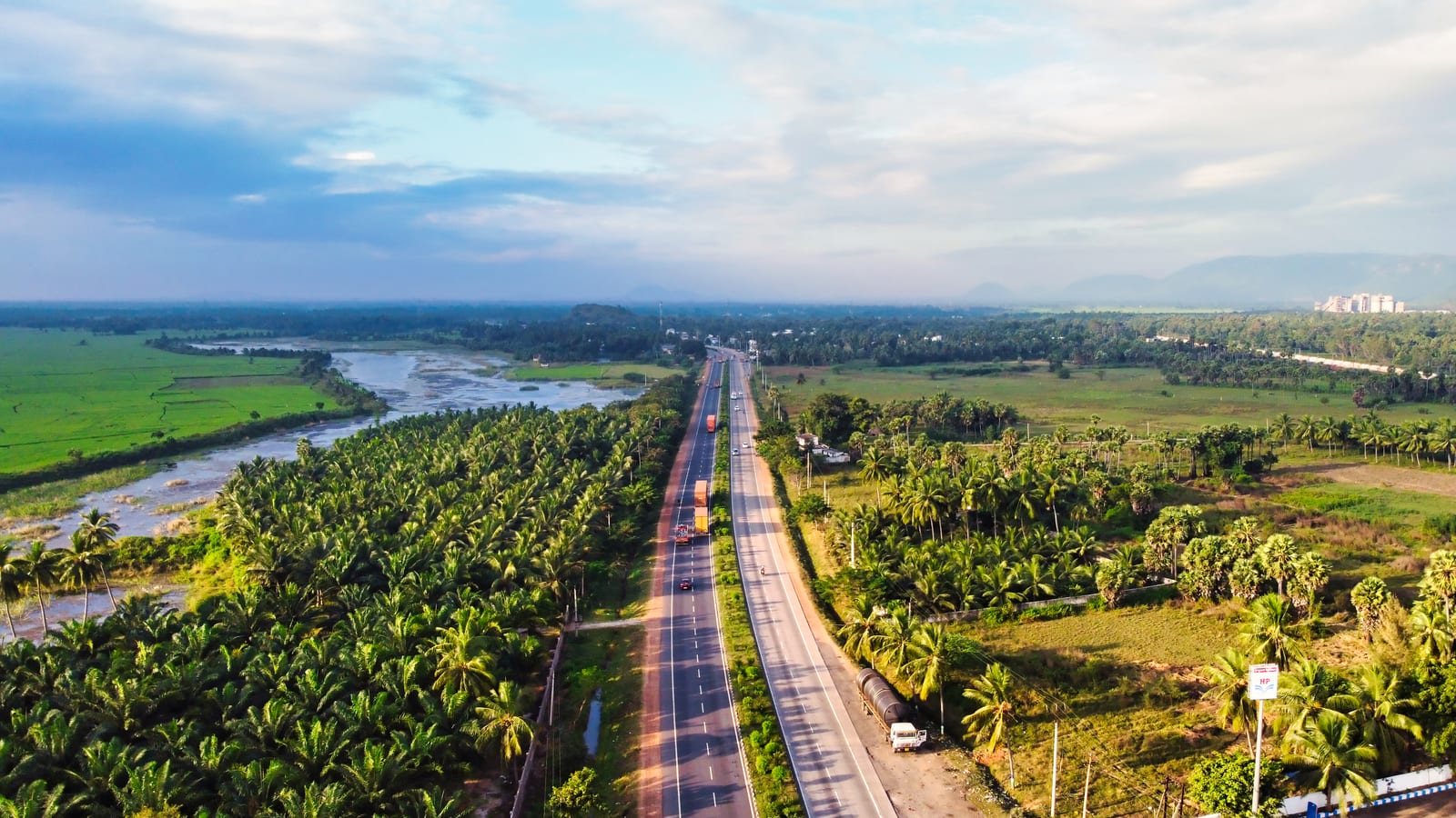 Aerial view of a national highway through Andhra Pradesh, representing Worlds Tours and Travels routes